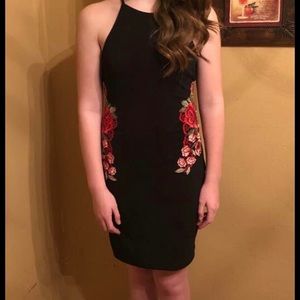Black Cocktail dress with rose accents on the side
